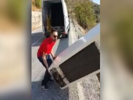 Man Throws Fridge Off Cliff, Cops Make Him Drag It Back. Watch Man Throws Fridge Off Cliff, Cops Make Him Drag It Back. Watch