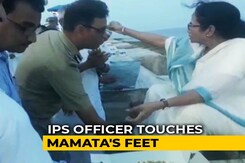 On Camera, IPS Officer Touches Mamata Banerjee's Feet After She Feeds Cake On Camera, IPS Officer Touches Mamata Banerjee's Feet After She Feeds Cake
