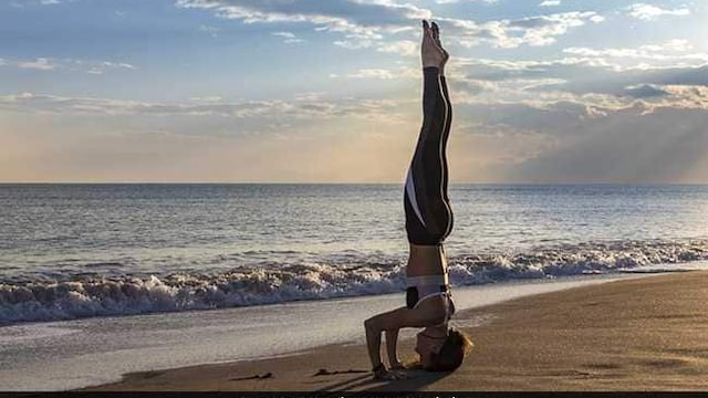 Headstands benefits: Inversion asanas like headstands can improve blood circulation and boost energy