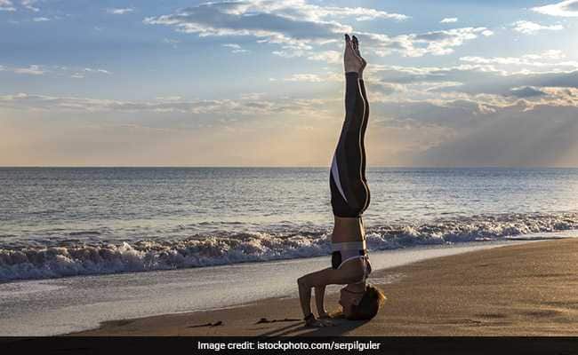 Headstands benefits: Inversion asanas like headstands can improve blood circulation and boost energy