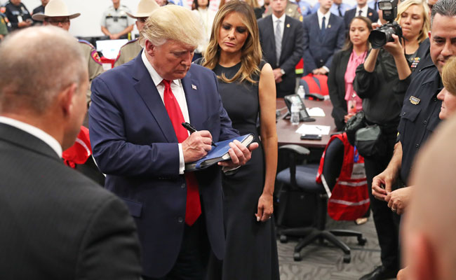 Trump's Thumbs-Up Pic With Orphaned Baby In Mass Shooting Sparks Outrage
