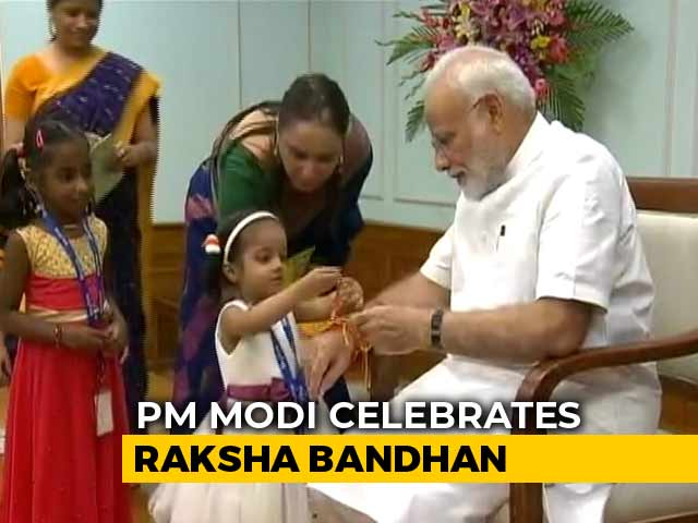 Children, Women Tie Rakhi To PM Modi On Raksha Bandhan