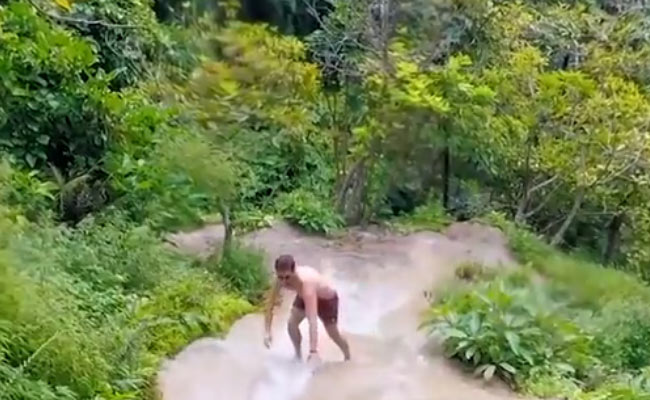 You Can Climb Up This 330-Foot 'Sticky' Waterfall In Thailand