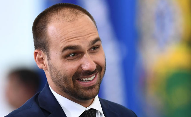 Brazil President's Son Heads To US To "Thank" Trump For Amazon Support