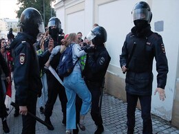 Video Of Russian Policeman Punching Female Protester Stirs Anger Video Of Russian Policeman Punching Female Protester Stirs Anger