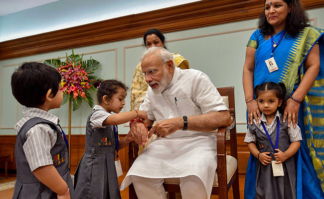 Children, Women Tie Rakhi To PM Modi On Raksha Bandhan