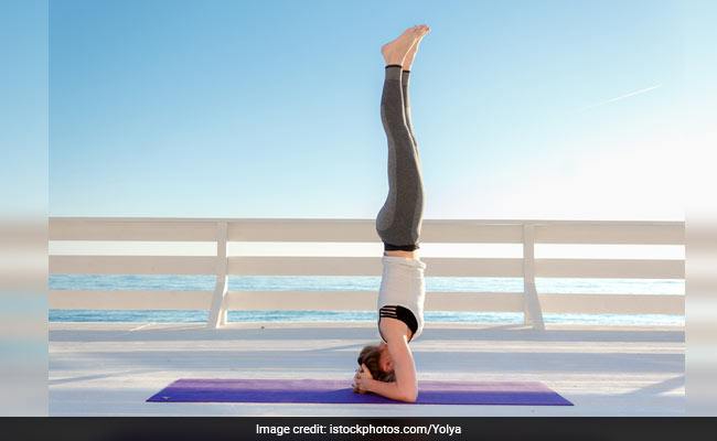 Headstands can be beneficial for people with thyroid issues