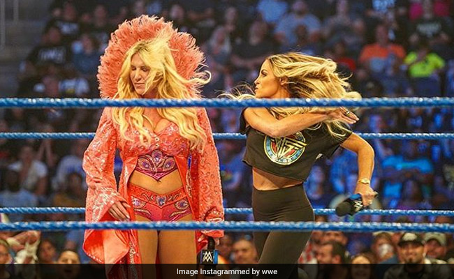 WWE SummerSlam: रिंग में एंट्री करते ही शार्लट का हुआ बुरा हाल, ट्रिश ने चांटों से किया मुंह लाल WWE SummerSlam: रिंग में एंट्री करते ही शार्लट का हुआ बुरा हाल, ट्रिश ने चांटों से किया मुंह लाल