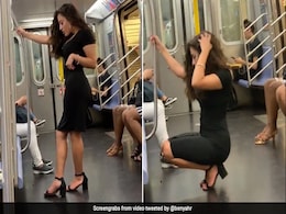 Woman's Photoshoot On A Train Is Viral And People Love Her Confidence Woman's Photoshoot On A Train Is Viral And People Love Her Confidence