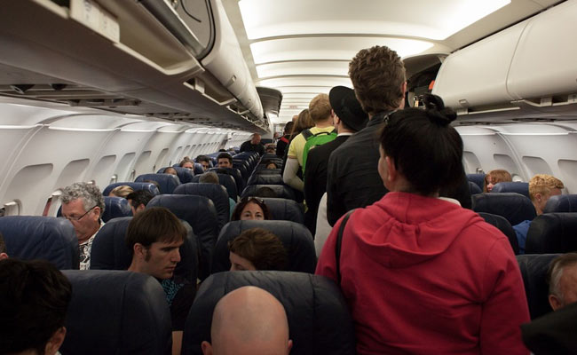 Midair Pajama Change, Barefoot On Seat: Strange Stuff People Do On Planes
