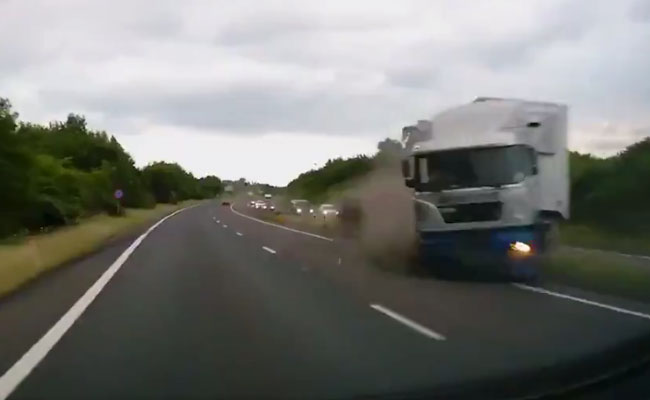 Dashcam Captures Moment Driver Narrowly Avoids Lorry Crash