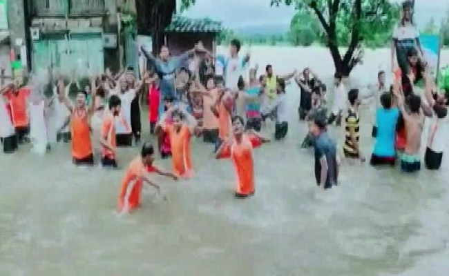 Locals Dance On Waterlogged National Highway In Karnataka's Belagvi