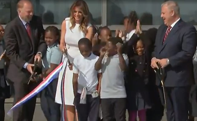 Watch: Melania Trump, With Large Scissors, Struggles To Cut Ribbon