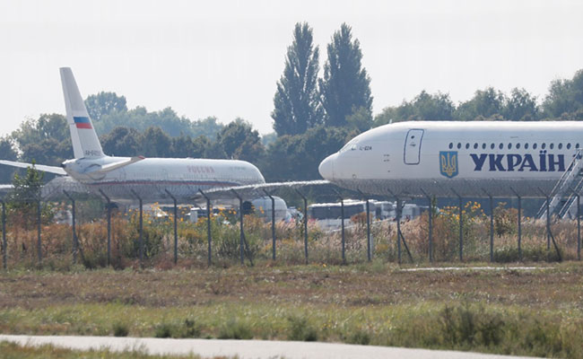 Russia, Ukraine Swap Prisoners In Landmark Sign Of Thawing Relations