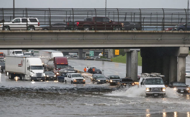 Tropical Storm Kills Two In Houston, Halts Flights, Floods Roads