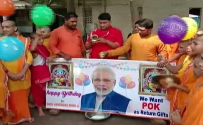 Workers Of NDA Ally Pour Milk On PM's Photo, Want PoK As Return Gift