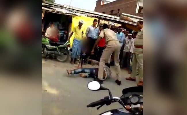 Video Shows UP Cops Thrashing Young Man As His Terrified Niece Looks On