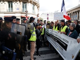 French Police Break Up Yellow Vest Protest With Tear Gas French Police Break Up Yellow Vest Protest With Tear Gas