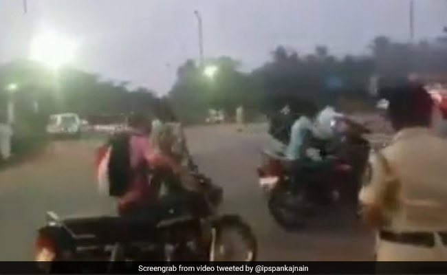 Watch: To Avoid Fines For No Helmets, Riders Walk Past Cops With Vehicles