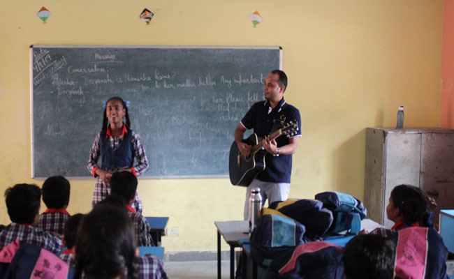 On Teachers' Day, Oxford University Press Employees Teach At Charity Schools
