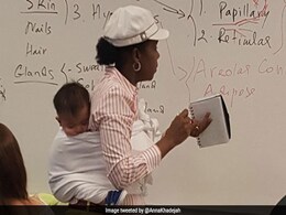 Professor Holds Baby For 3 Hours In Class So His Mother Could Take Notes Professor Holds Baby For 3 Hours In Class So His Mother Could Take Notes