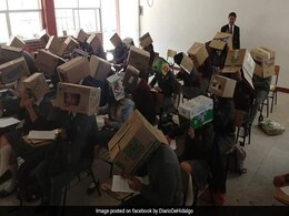 In Bizarre Incident, Teacher Makes Kids Wear Boxes To Prevent Cheating In Bizarre Incident, Teacher Makes Kids Wear Boxes To Prevent Cheating