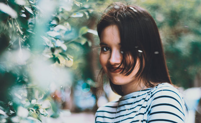 7 Women's Tops That Give Stripes A Cool Twist