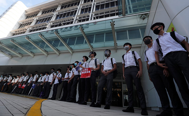 Hong Kong School Students Form Human Chain After Weekend Of Protests