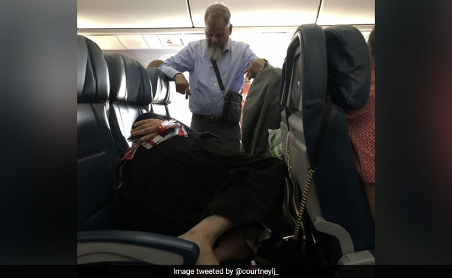 Man Stood For 6 Hours In Flight To Let Wife Sleep. Twitter Divided