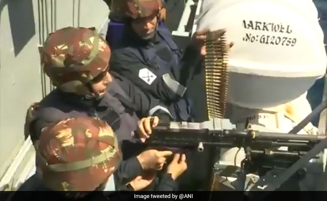 Watch: Rajnath Singh Fires Machine Gun From Navy's Aircraft Carrier