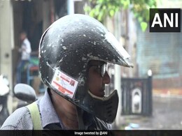 Vadodara Man Sticks Driving License, Insurance On Helmet To Avoid Fines Vadodara Man Sticks Driving License, Insurance On Helmet To Avoid Fines