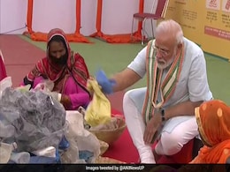 PM Picks Plastic From Waste Along With Garbage Workers In UP PM Picks Plastic From Waste Along With Garbage Workers In UP