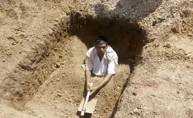 Dejected Telangana Farmer Digs His Own Grave, Tries To Bury Himself Alive