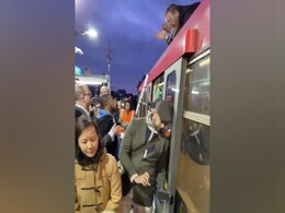 Climate Activist Climbs On Top Of London Train, Dragged Off By Commuters Climate Activist Climbs On Top Of London Train, Dragged Off By Commuters