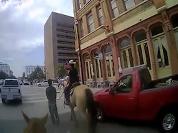 "Stay Next To Me": US Cop, On Horseback, Leads Black Man Tied To Rope "Stay Next To Me": US Cop, On Horseback, Leads Black Man Tied To Rope