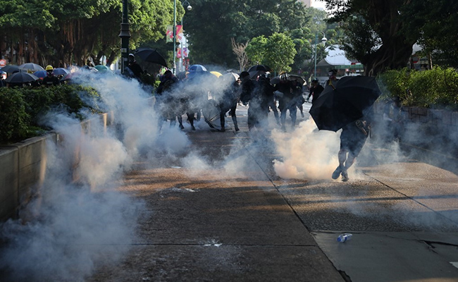 Hong Kong Protesters Defy Police After Activists Attacked
