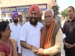 ML Khattar Shares Light Moment With Congress Rival On Polling Day ML Khattar Shares Light Moment With Congress Rival On Polling Day