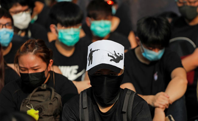 Hong Kong Mops Up, Braces For Fresh Protests After National Day Violence