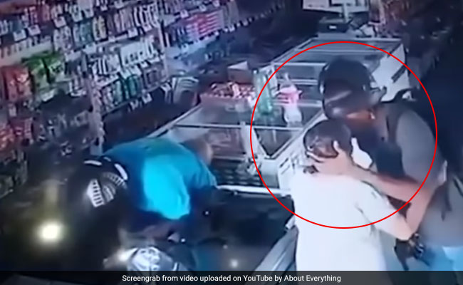 Watch: Armed Robber Refuses Cash From Elderly Woman, Kisses Her Forehead