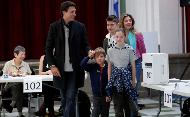 Justin Trudeau's Party Takes Early Lead As First Polls Close In Canada