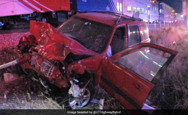 Watch: US Cop Pulls Out Man From Car Seconds Before Train Hits It