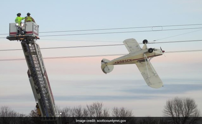 Pilot Rescued After Plane Gets Entangled In High-Voltage Power Lines