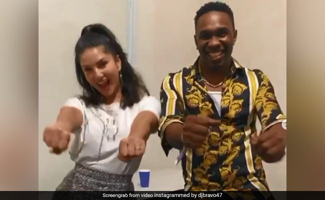 सनी लियोन ने ड्वेन ब्रावो के साथ 'चैंपियन सॉन्ग' पर मचाया धमाल, देखें धमाकेदार Video