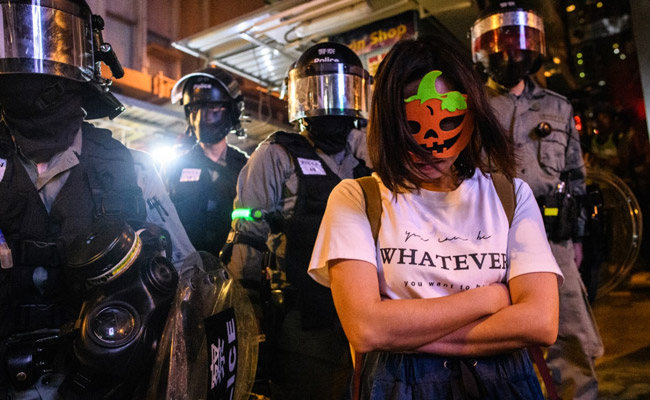 Halloween Is Latest Victim Of Hong Kong's Crackdown On Masked Protests