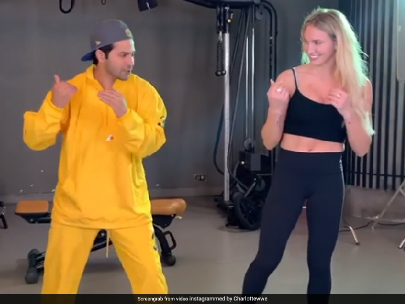 Watch: Varun Dhawan Teaches "Bollywood Dance Moves" To WWE Diva Charlotte Flair