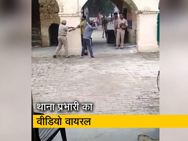 थाना प्रभारी ने युवक को खंभे में बांधकर पीटा