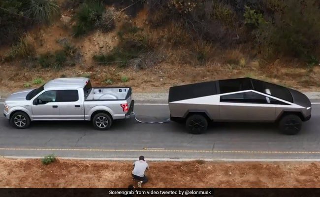 Elon Musk Tweets Cybertruck Winning Tug-Of-War. Ford Wants A Rematch