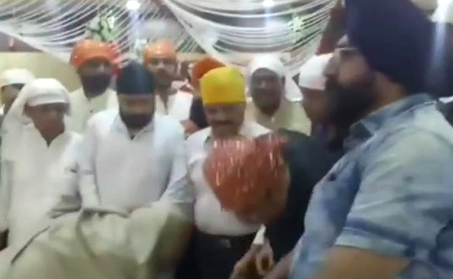Madhya Pradesh Bureaucrat Seen Touching Minister's Feet In Viral Clip