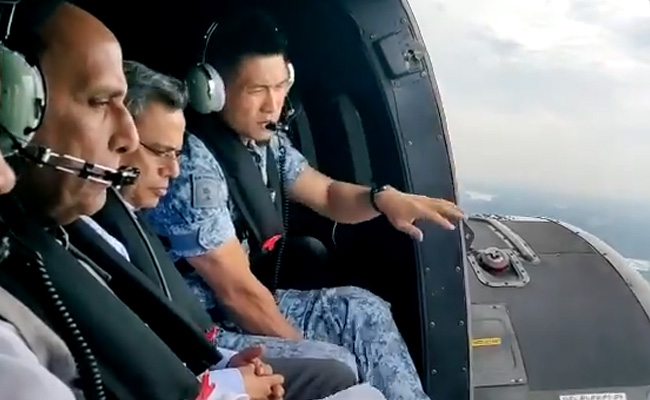 Rajnath Singh Takes Sortie In Singapore Air Force's Super Puma Helicopter
