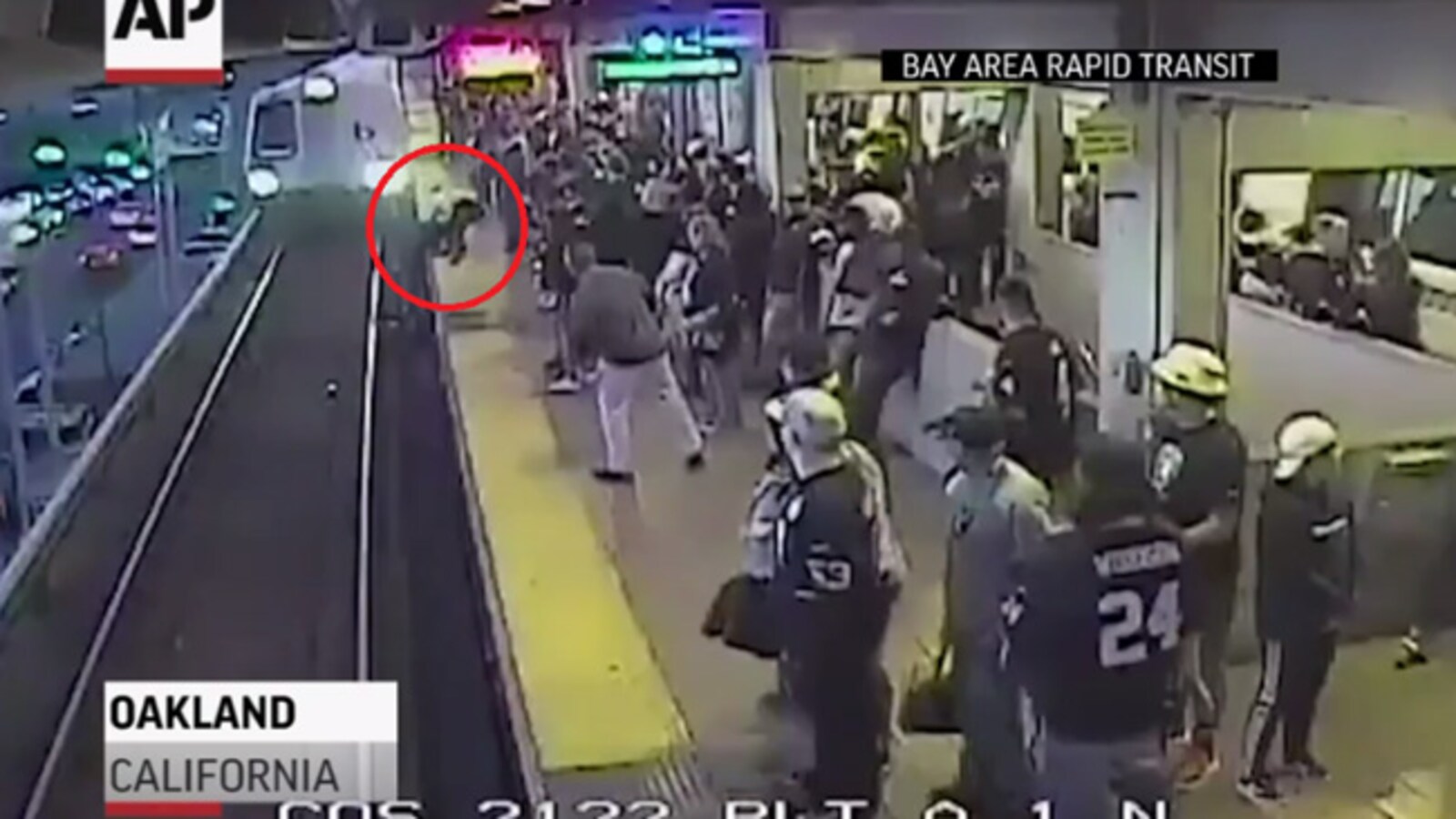 Man Pulled From Tracks Seconds Before Train Arrives In Dramatic Video